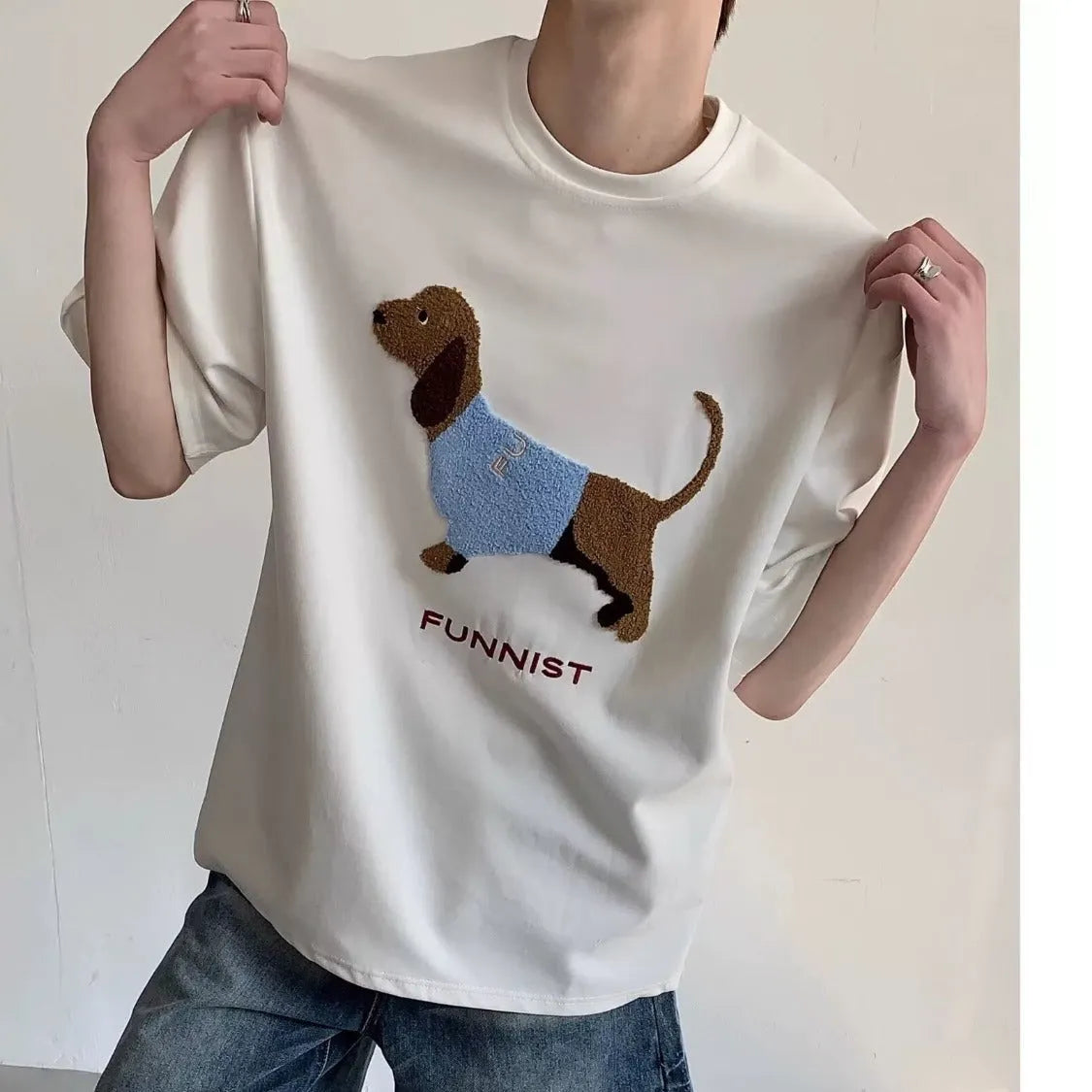 Men's grey T-shirt with embroidered sausage dog design on front, round neck and short sleeves
