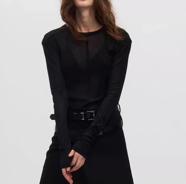 Black slim-fit long sleeve pullover made from ultra-thin see-through PU mesh fabric on a hanger.