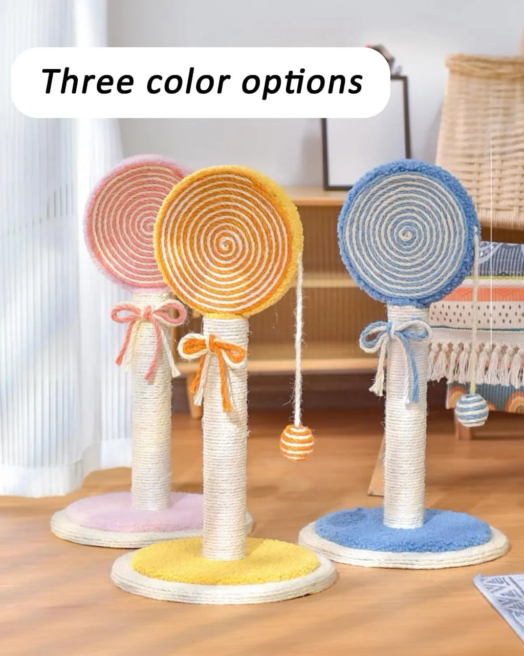 Blue cat scratching post with sisal rope and a hanging yellow ball on a sturdy square base