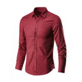 Loose-fit long-sleeve linen shirt shown in a neutral colour.