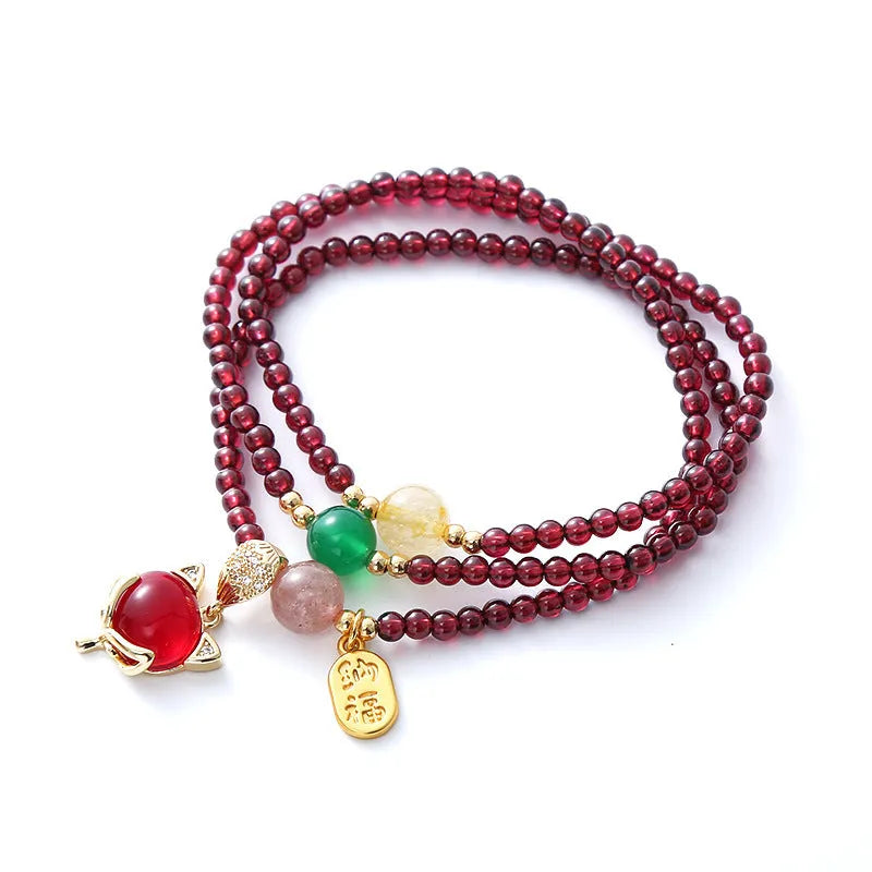 Purplish red garnet fox charm bracelet with adjustable rope closure for women