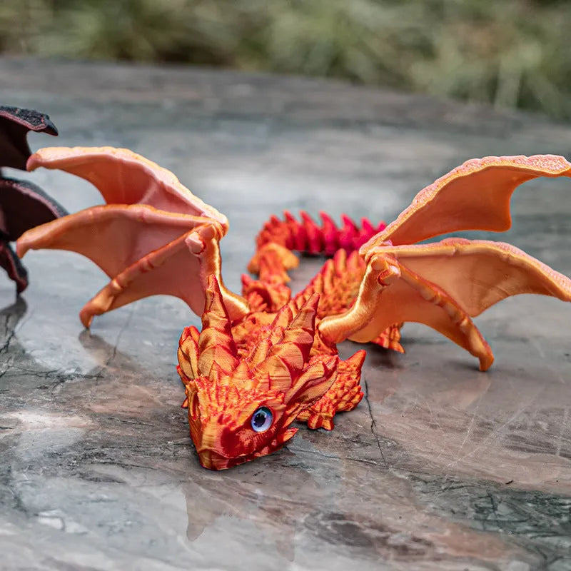 Red and gold printed dragon wings decorative toy made of PLA plastic.