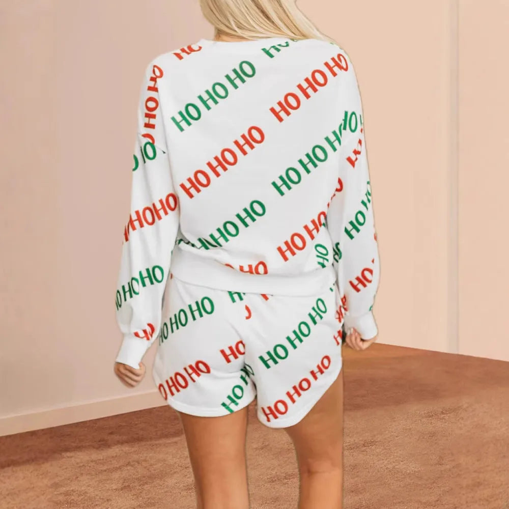 White women's two-piece suit with letters printed design, long sleeves, and contrast colour detailing