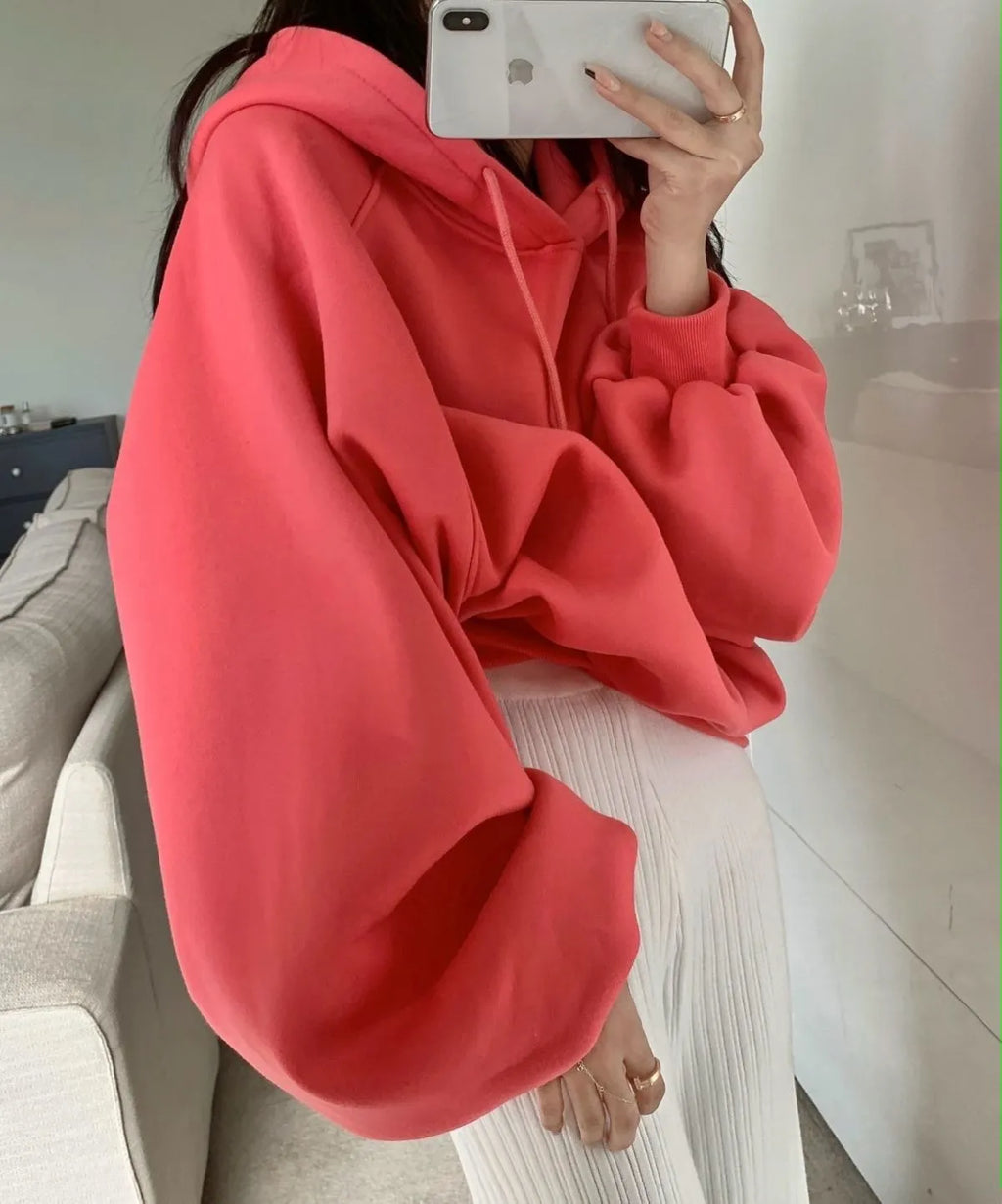 Watermelon red women's loose hooded pullover sweater made from mulberry silk fabric.