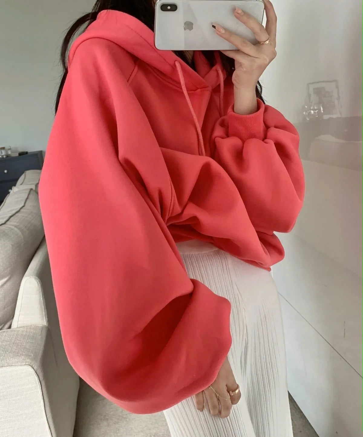 Watermelon red women's loose hooded pullover sweater made from mulberry silk fabric.