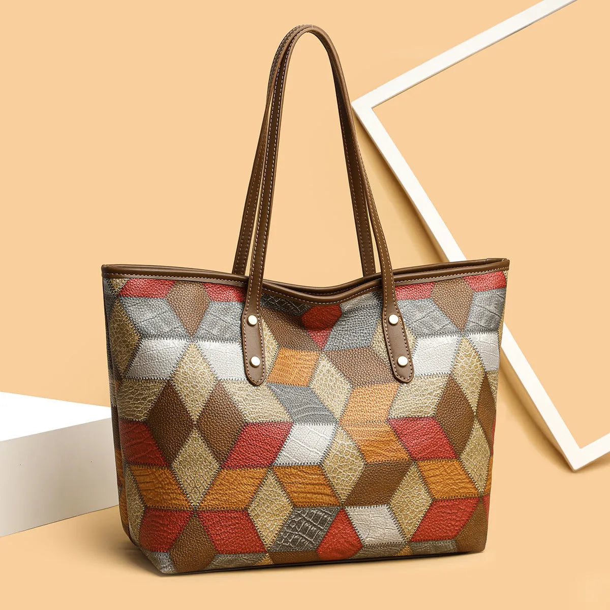 Blue brown women's PVC shoulder handbag with large capacity and outer pockets.