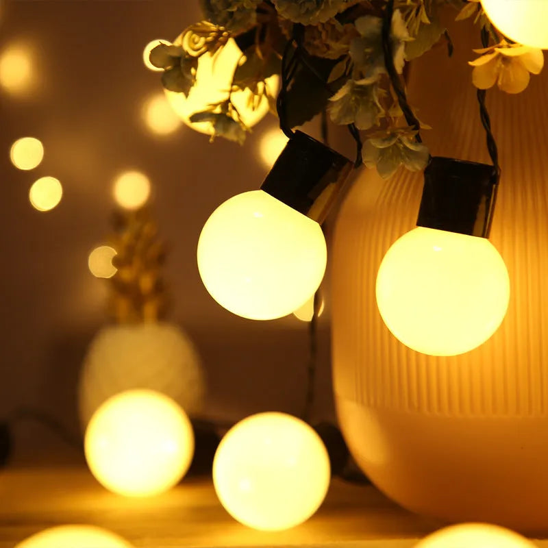 10-metre solar powered decorative light string with 40 LED lights and black cable for outdoor festival use