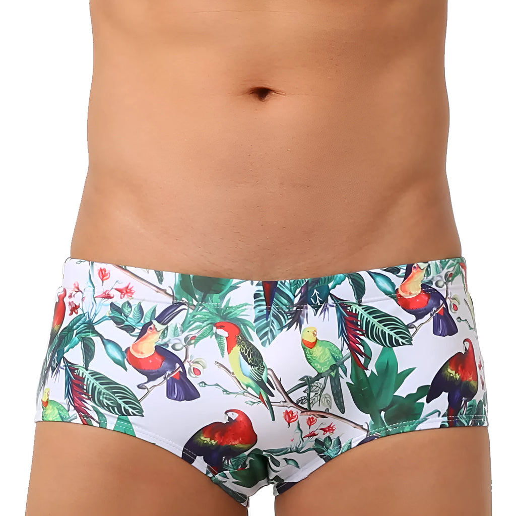 Men's navy swim trunks with colourful flower and bird print pattern, boxer style