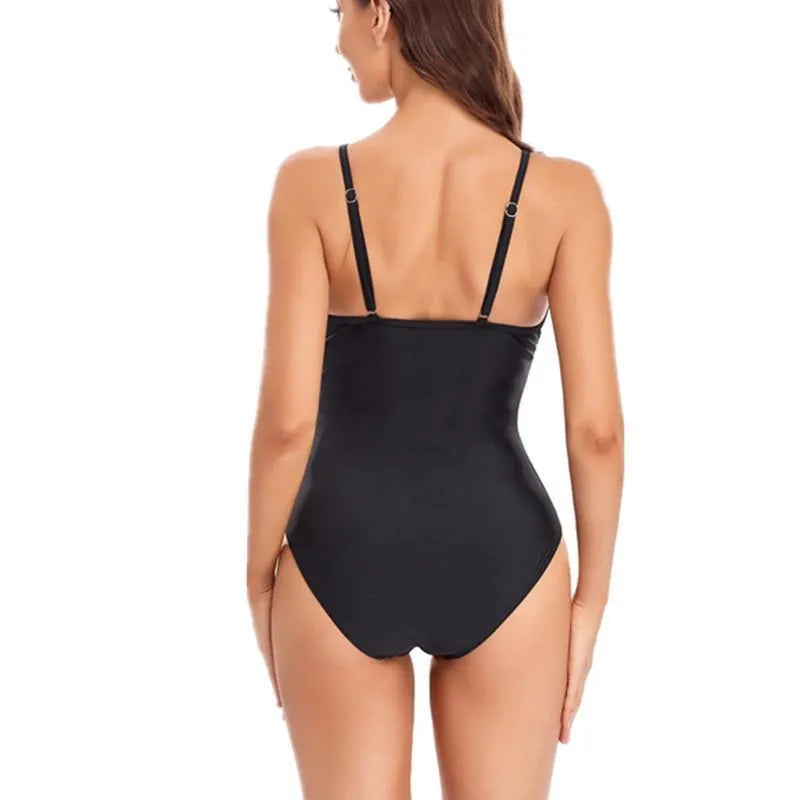 Ladies solid color backless one-piece swimsuit in black or blue with high elasticity mesh lining