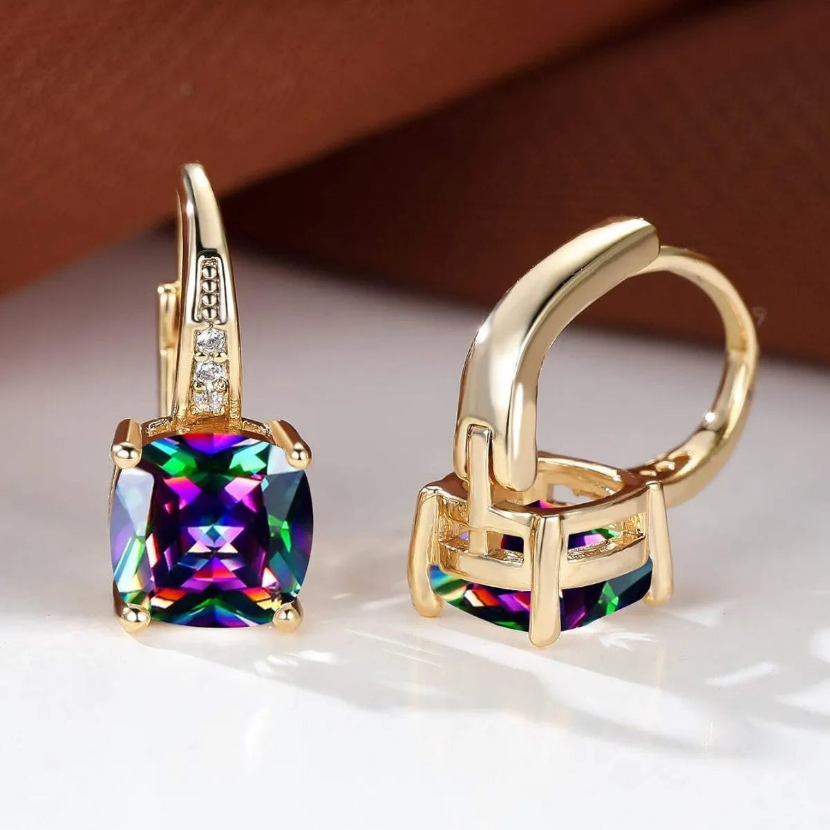 Square geometric copper ear clip with colourful moissanite inlays and electroplated gold finish