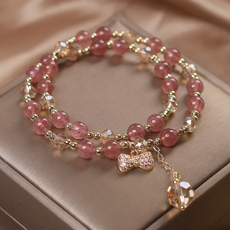 Double layer strawberry quartz bracelet with lucky cat charms and red cat's eye flower beads