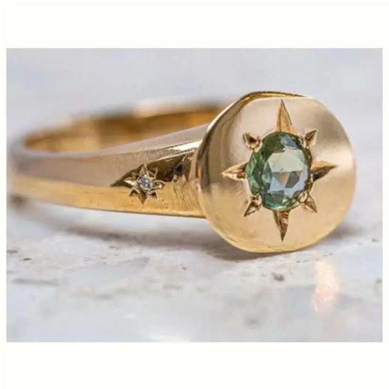 Adjustable gold ring with oval asterism zircon star shape centrepiece on zinc alloy band