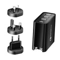 White and black multi-port USB fast wall charger with PD and QC 3.0 support on a table.