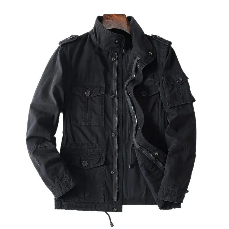 Man wearing a loose-fit light brown cotton twill retro jacket with a zip front.