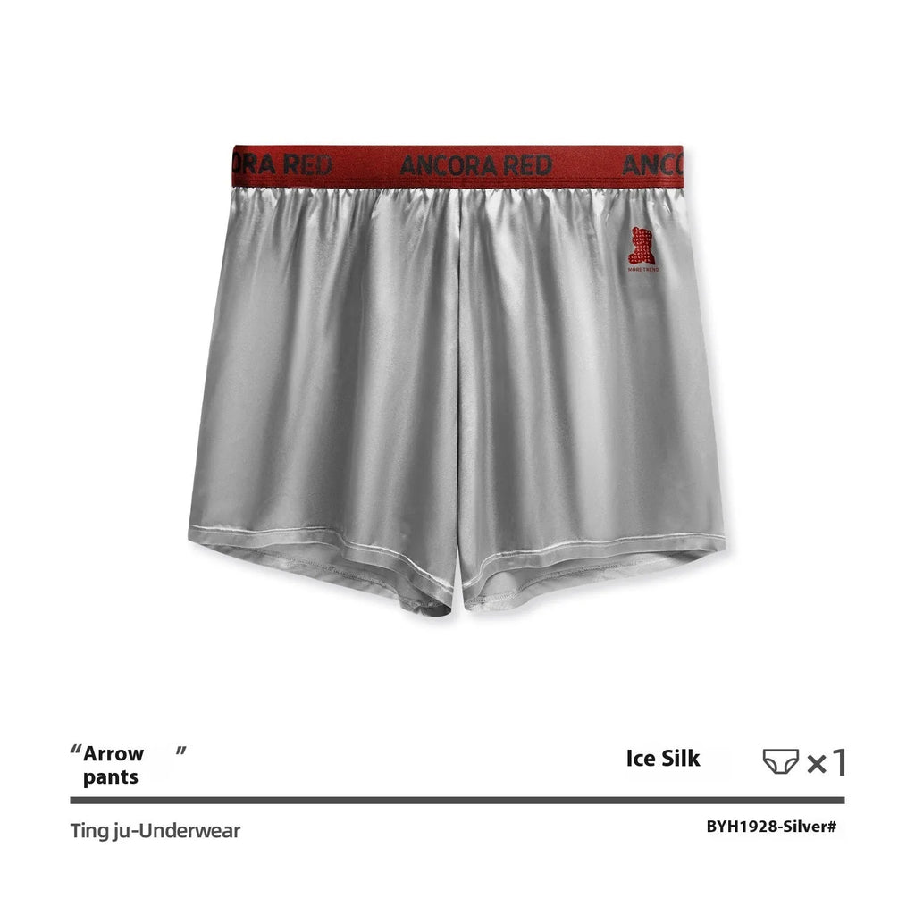 Men's solid colour polyester boxer briefs in black, shown laid flat to display the mid waist design.