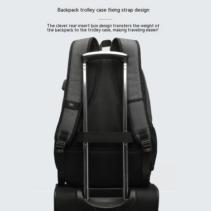 Grey nylon USB charging backpack with trolley sleeve showing dimensions and charging port