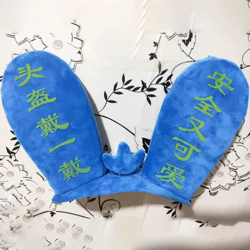 Rabbit Glow Ears helmet decoration with locomotive and ski designs on a Velcro base