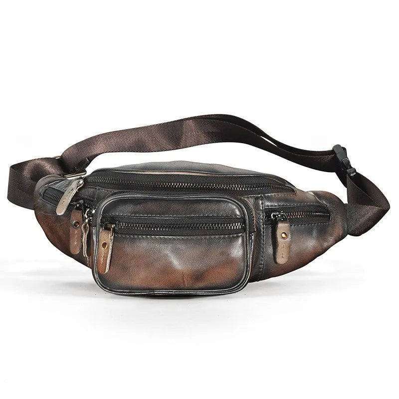 Brown cowhide leather messenger bag with a single shoulder strap, shown closed.