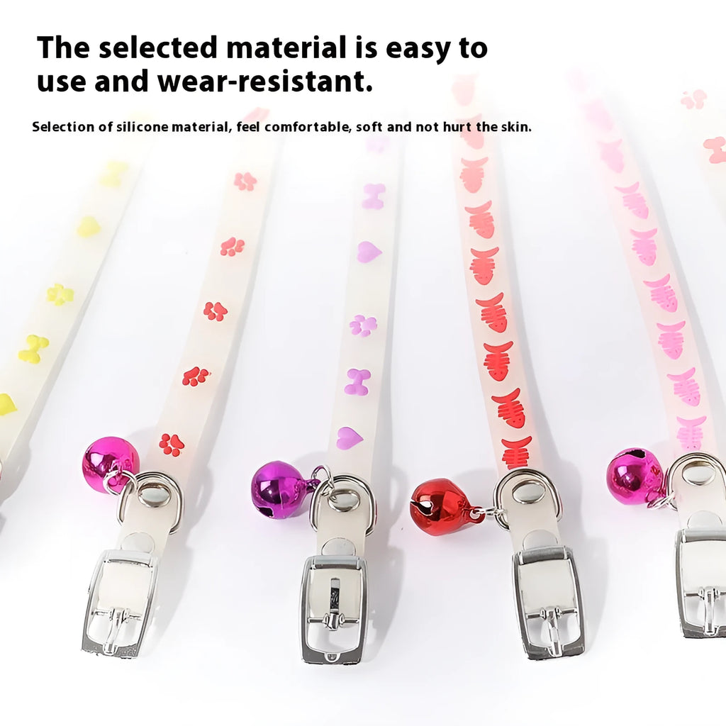 Cat luminous collar with adjustable silicone strap and metal bell showing paw print pattern
