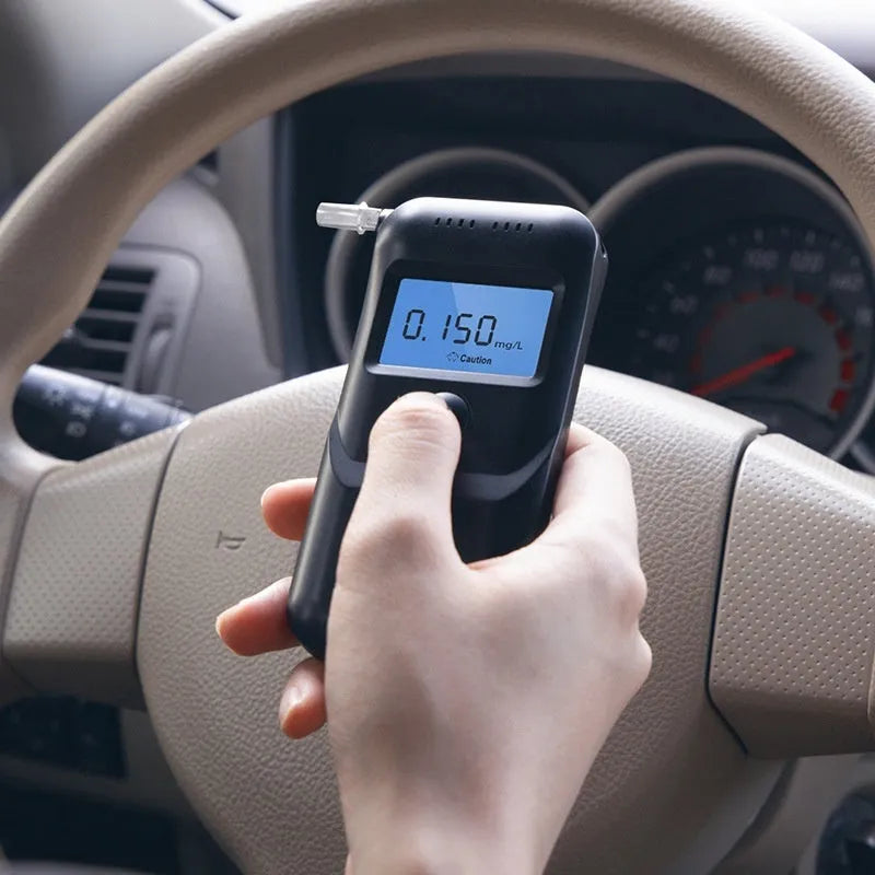 Black handheld alcohol breath tester device for personal drinking level checks
