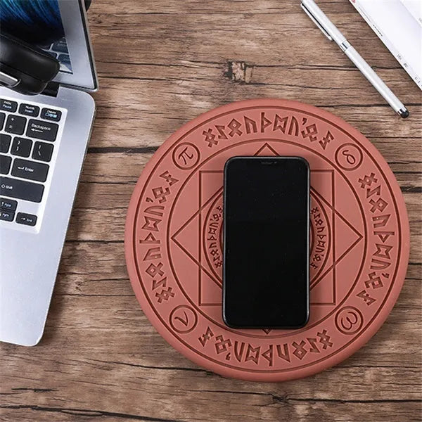 Square wireless phone charger with glowing magic array pattern showing 10W fast charging capability
