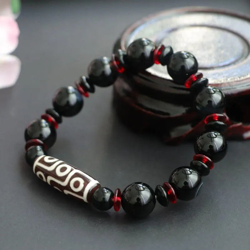 Hand-woven black agate Dzi bead bracelet with geometric design and national style elements