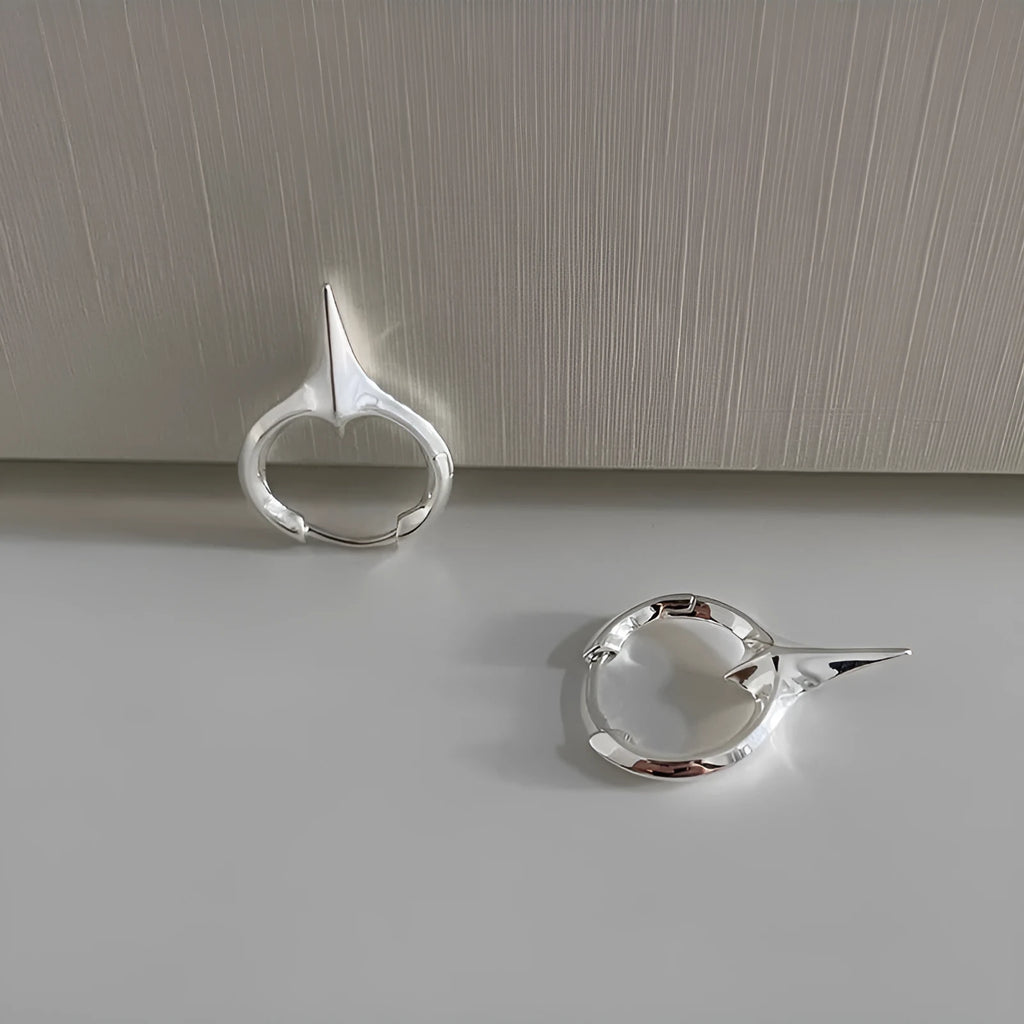 Geometric star-shaped ear clip for women with electroplated copper construction and platinum colour option