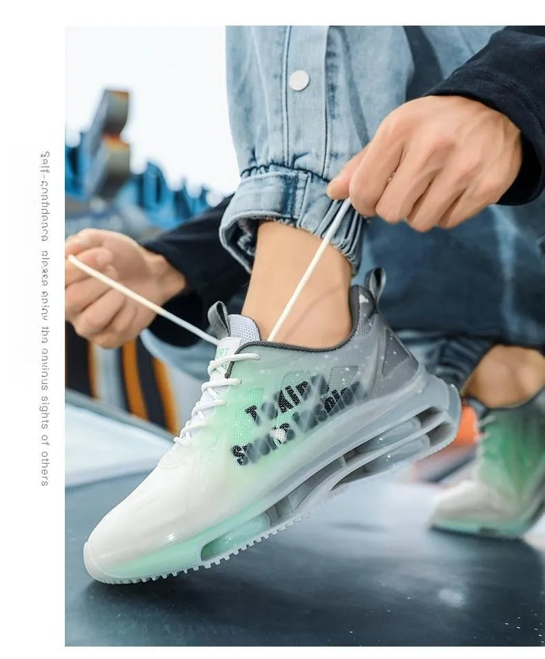 Men's black and green platform trainer shoes with mesh upper and rubber sole on a white background.