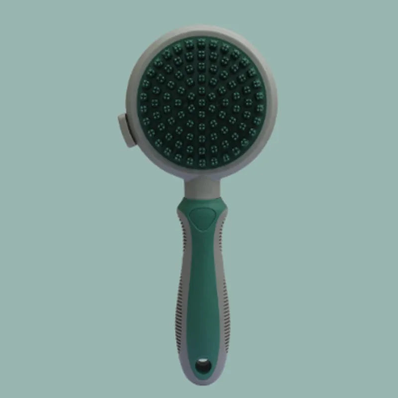 Green and pink dual-sided silicone pet grooming brush with retractable slicker and octopus-toothed massager.