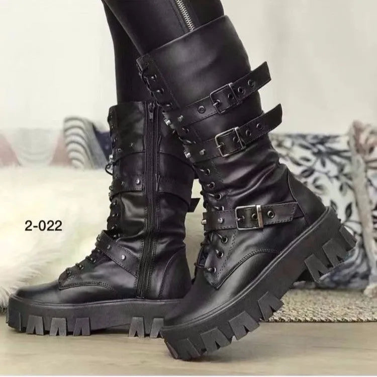 Women's black mid-calf knight boots with a large metal buckle and side zip fastening