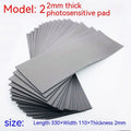 Black and grey plastic light-sensitive mat for calligraphy seal pottery measuring 330 by 110 millimetres