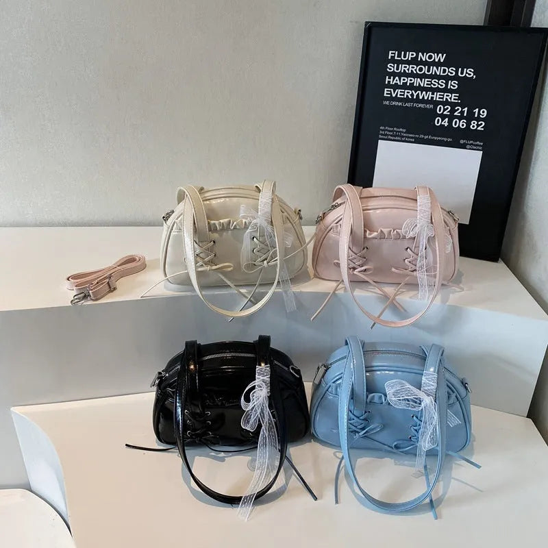Women's bandage bow PU leather handbag with shoulder strap and internal phone compartment