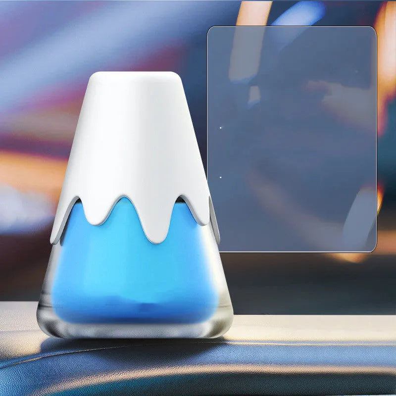 Glass paste car air freshener in one of four colours on a white background.