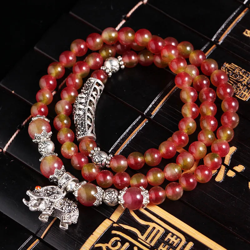 Natural watermelon crystal bracelet with Chinese knot and geometric elephant-style beads