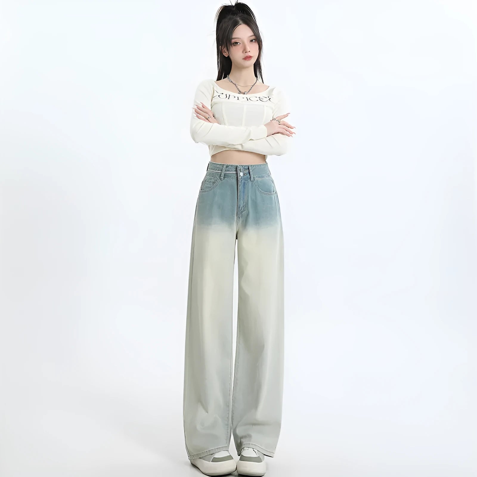 Women's gradient blue straight-leg denim trousers with wide-leg style on hanger