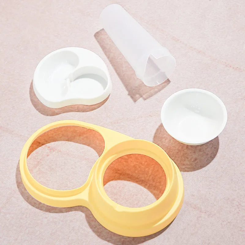 Grey and yellow dual ceramic bowl pet feeder with raised neck protection and non-slip base.