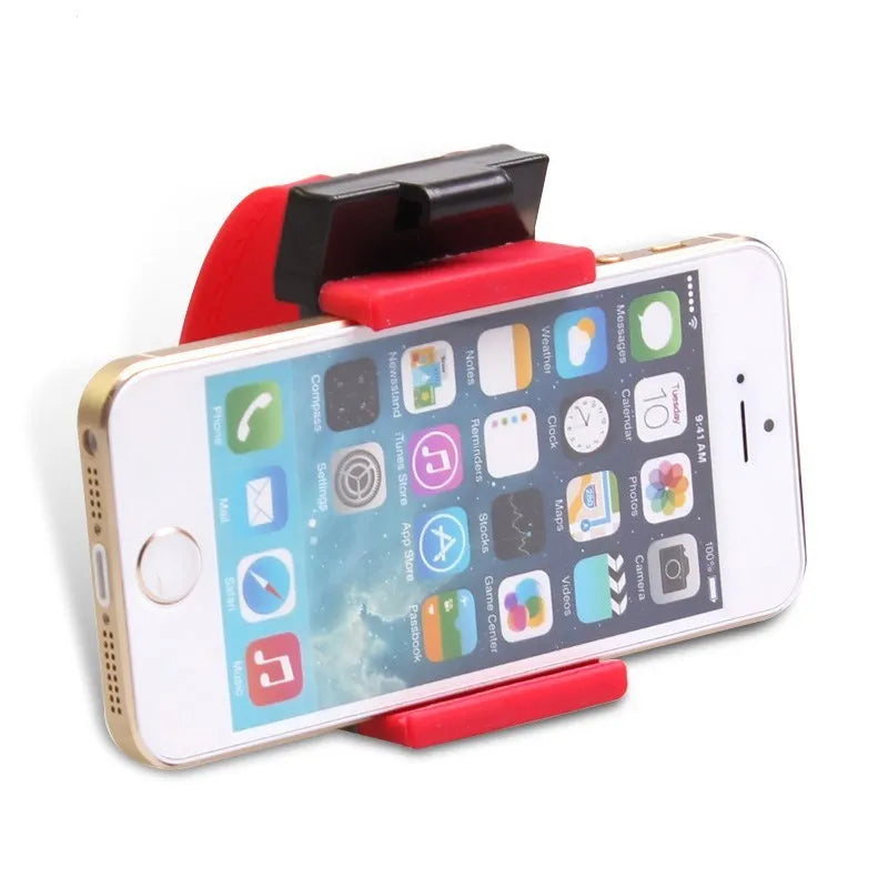 Black universal steering wheel phone holder clip for smartphones showing silicone pad