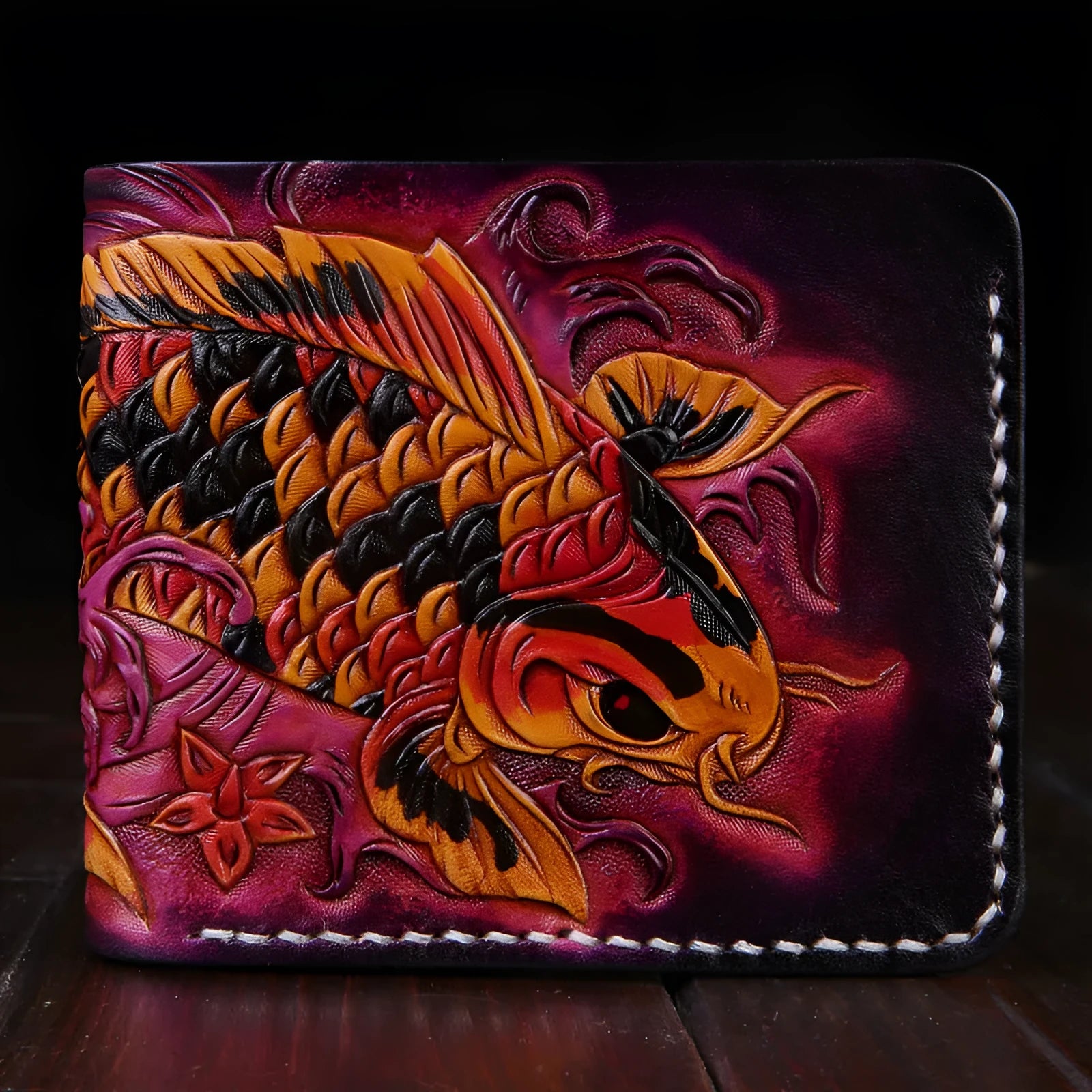 Hand-carved cow leather men's wallet in red colour showing open design and compact dimensions