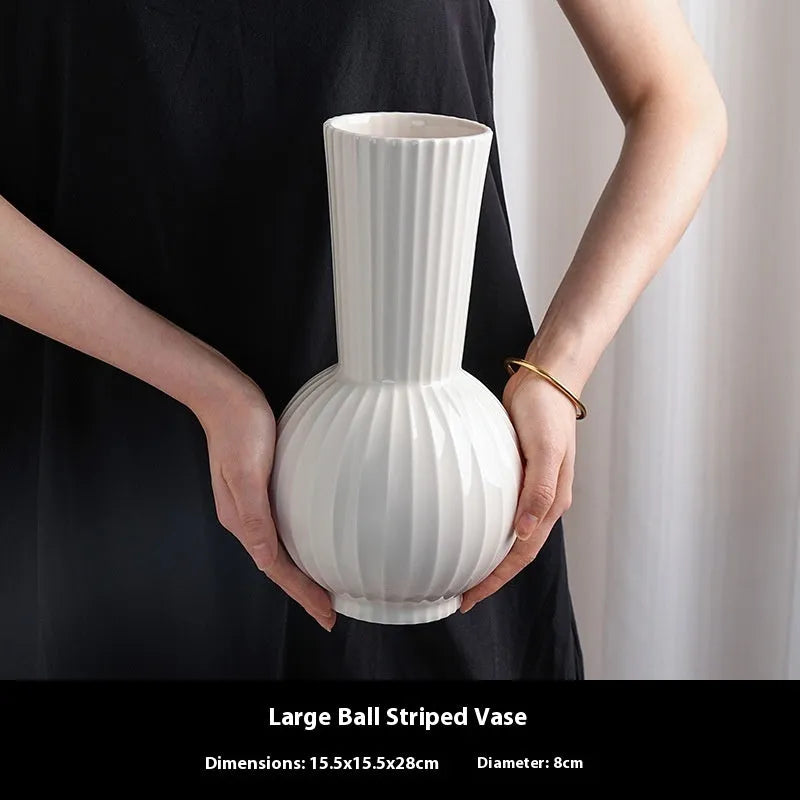 White ceramic ball striped vase on table with American country styling