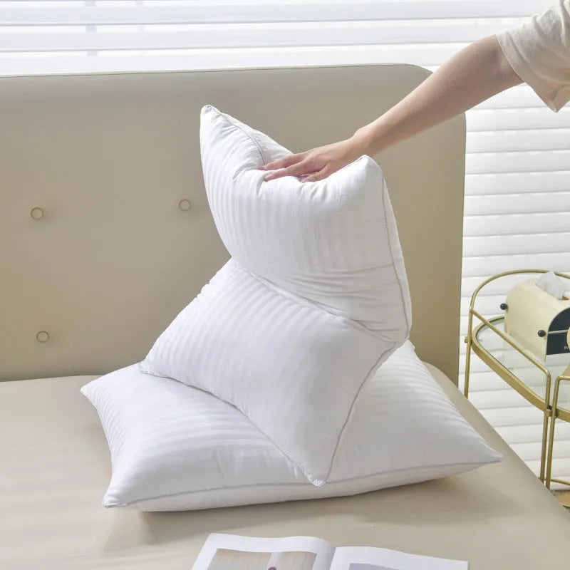 White satin stripe feather and cotton pillow core showing size options and loft variants.