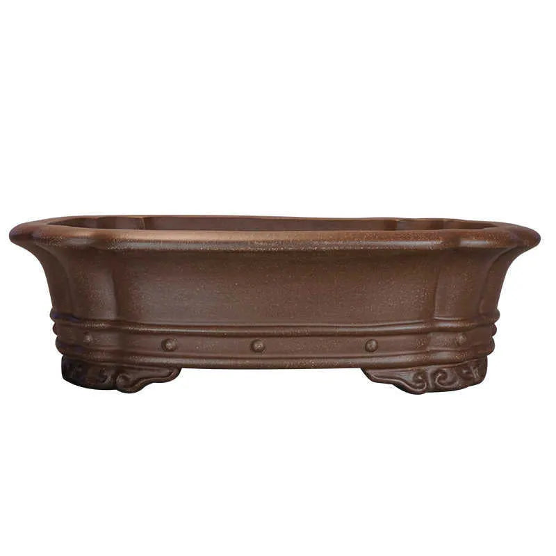 Handmade purple sand rectangular begonia flower pot on desktop