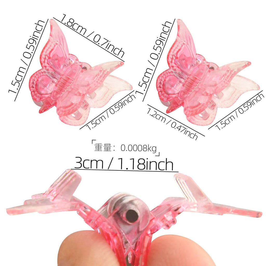 Set of 50 glitter mini butterfly hair claw clips in assorted colours on white background