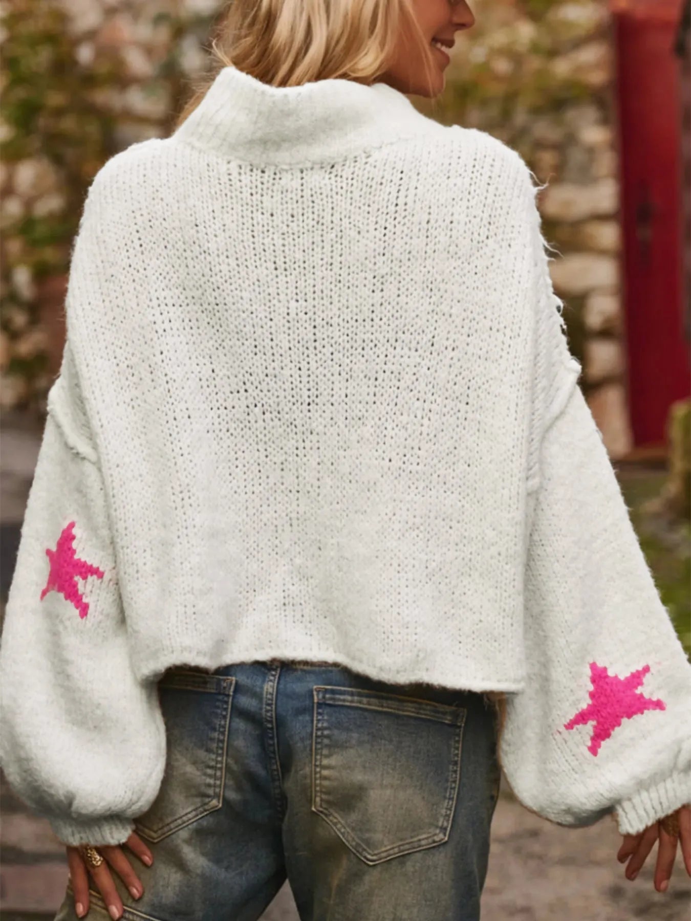 White women's turtleneck pullover with five-pointed star pattern and velvet-like fabric