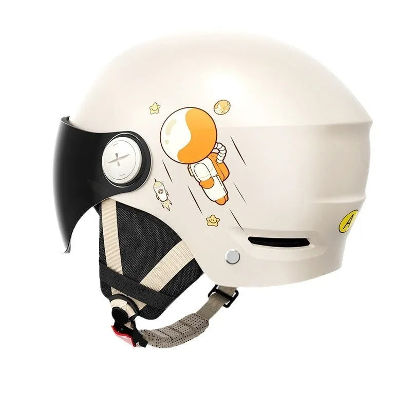 Khaki coloured electric motorcycle half helmet with interchangeable lens system shown from side view