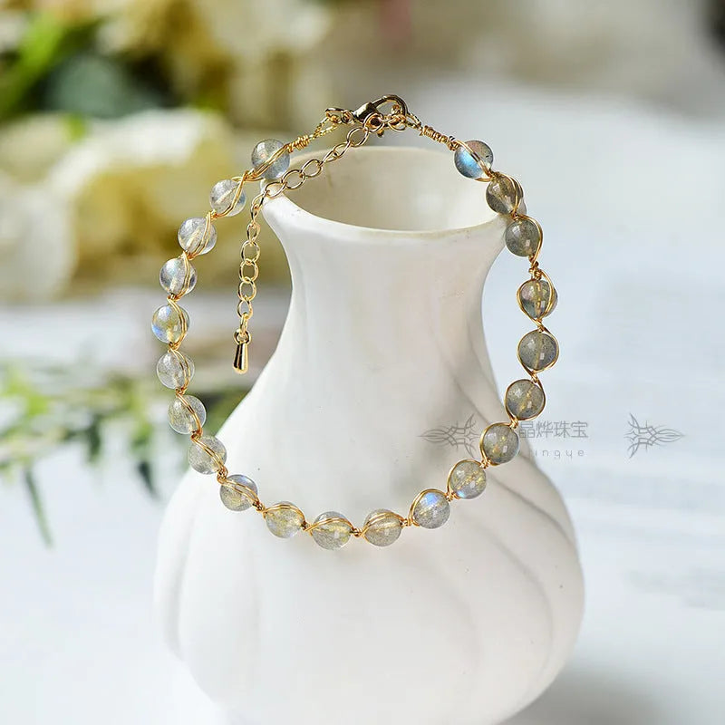Women's crystal bracelet with 6mm blue moonstone and 14K gold gilded metal detailing