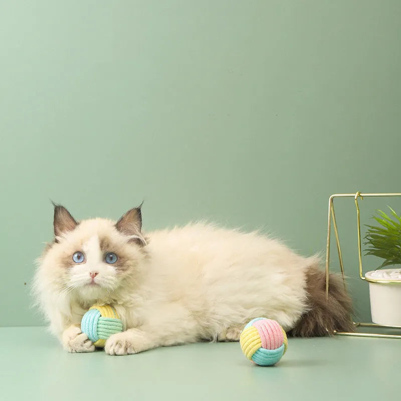 Handmade cat hairball plush toy made from cotton balls in blue powder colour