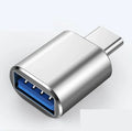 USB-C to dual USB-A OTG adapter in brushed aluminium, showing black, gold, and silver colour options.