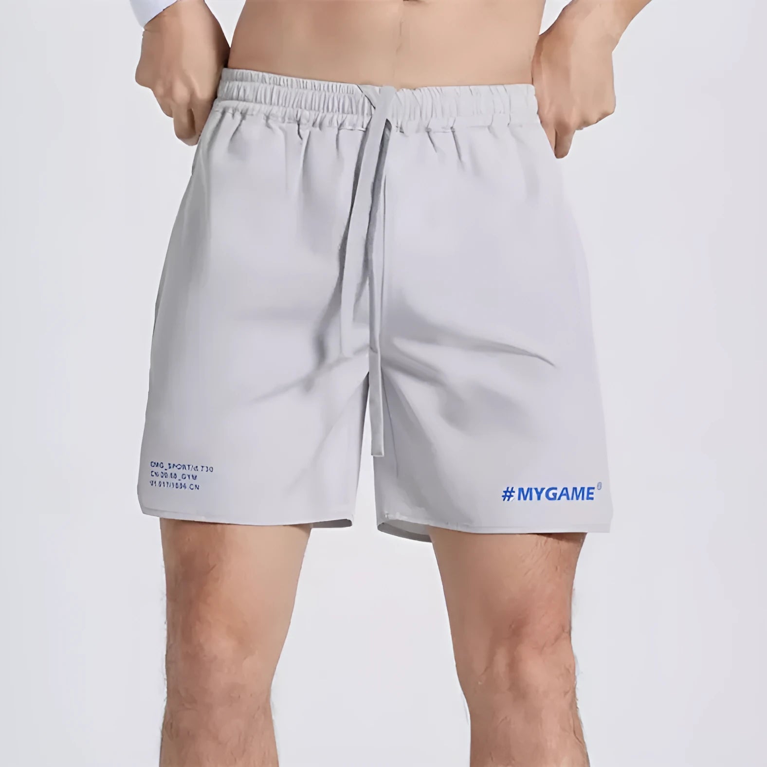 Men's blue training shorts with moisture-wicking fabric on a grey background.
