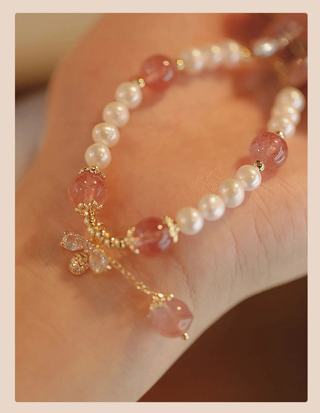 Women's strawberry quartz crystal bracelet with bow accents hand-strung in INS summer style