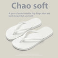 Flat casual slipper with hollow-out plastic upper and textured PVC sole in orange colour.